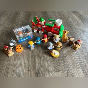 Fisher-Price Little People toys, primarily a Musical Christmas Train set and sev
